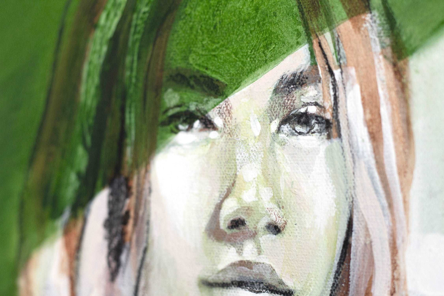 Close up detail of painting of a woans face in green hues.