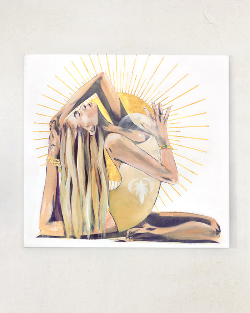 A painting of a woman doing yoga with a sun coming from her heart. Gold, yellow and white on a white wall.