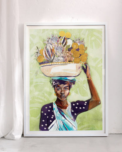 An art print of a woman holding a basket of fruit n her head. Framed in a white frame with a curtain next to it.