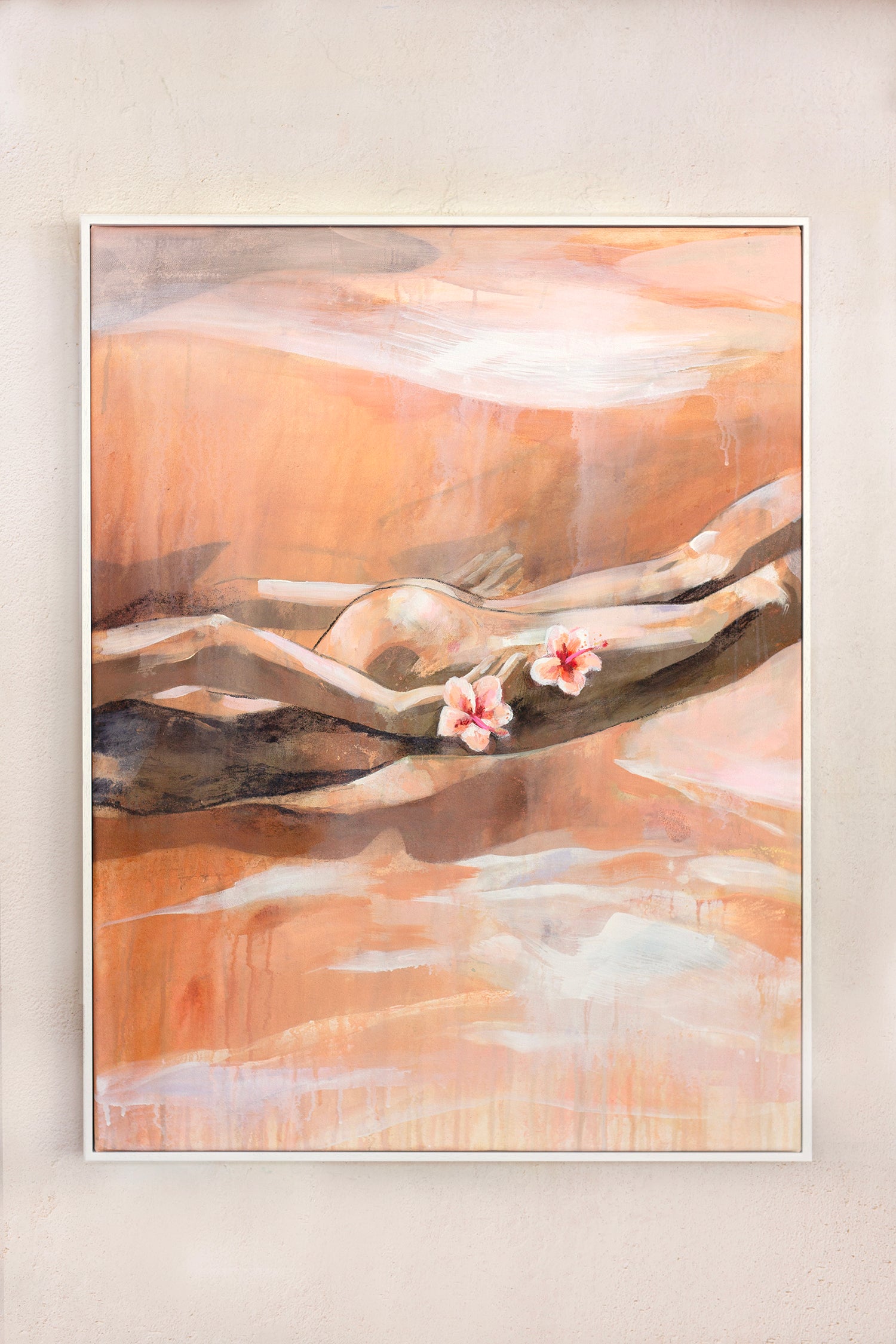 An abstract painting of a woman swimming underwater, holding two flowers, with warm earthy tones. Framed and hung on a beige wall.