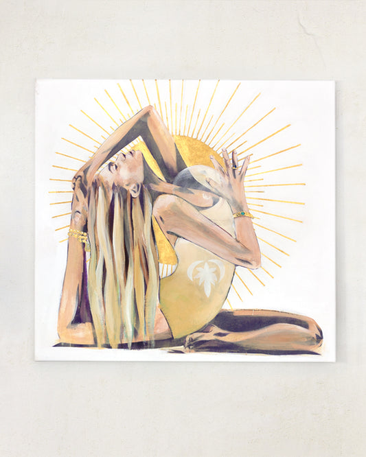 A painting of a woman doing yoga with a sun coming from her heart.  Gold, yellow and white on a white wall.