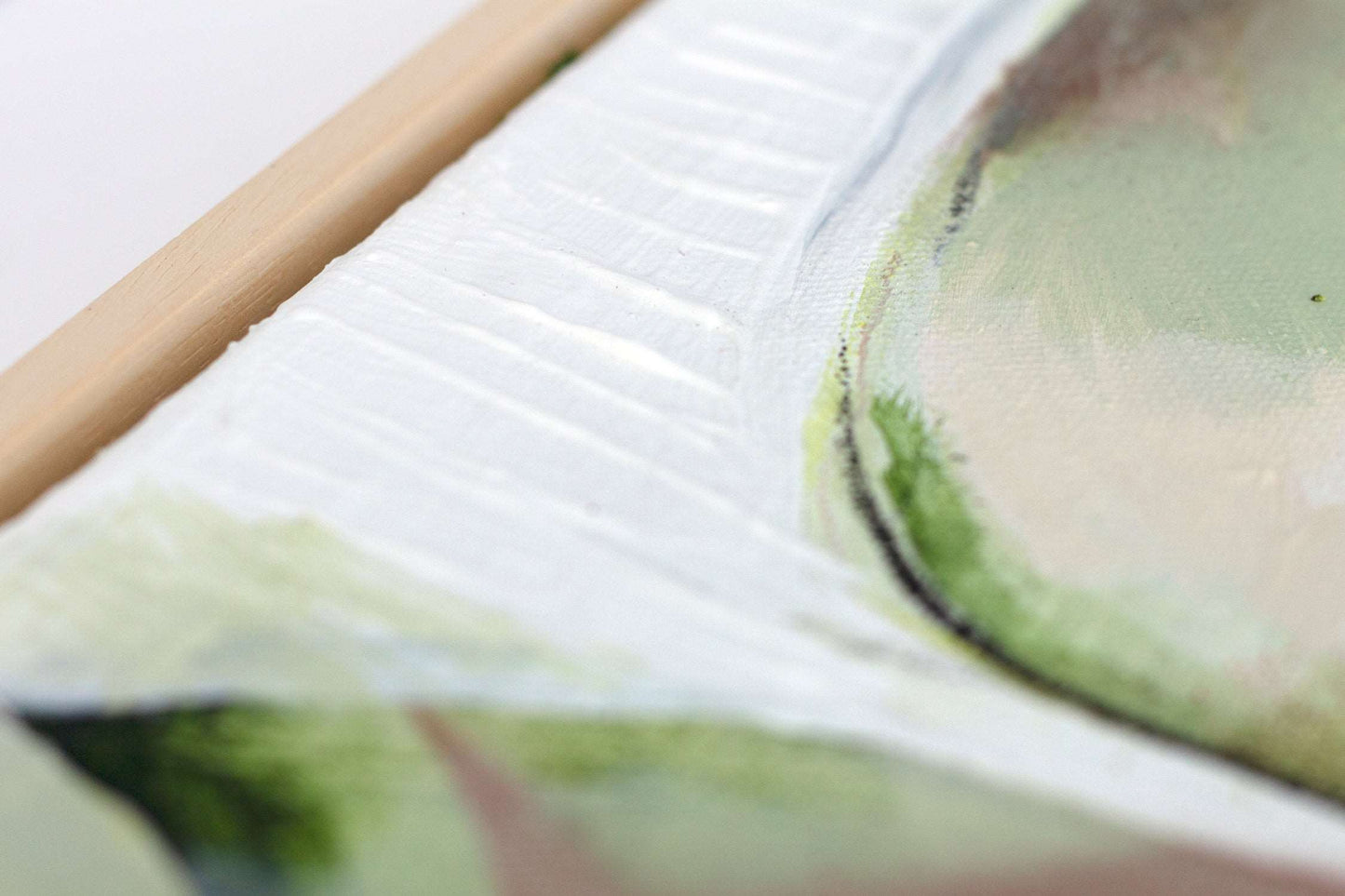 Close up art detail of painting Nourish by Hannah Adamaszek. Paint texture can be see and the natural wood frame.