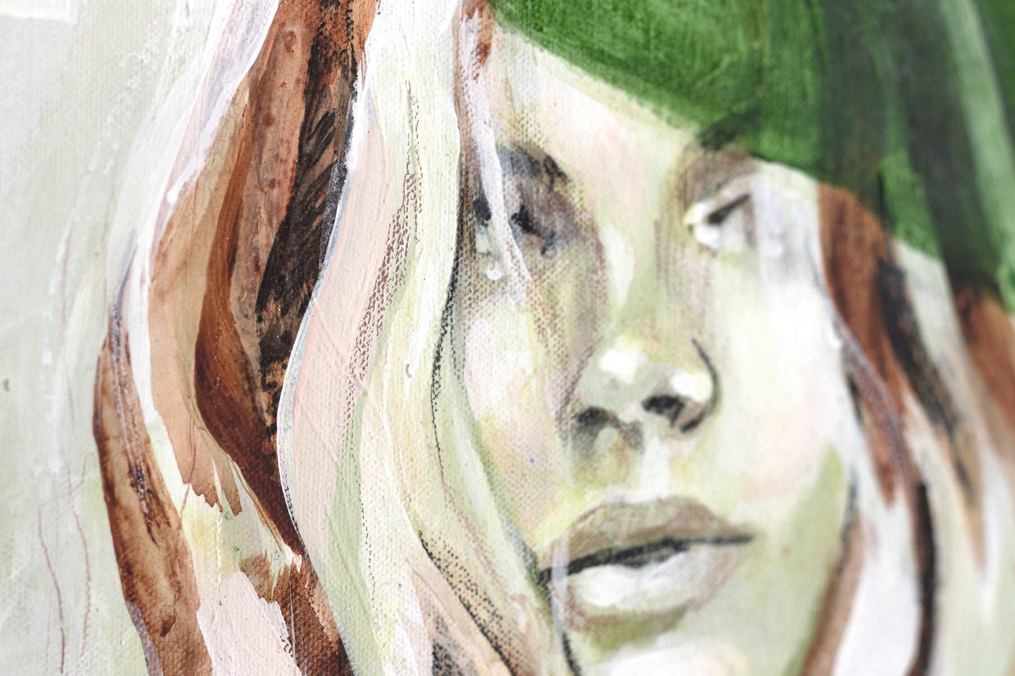 close up detail of painting Raw. Texture of the canvas a brush strokes can be seen on the woman's face.