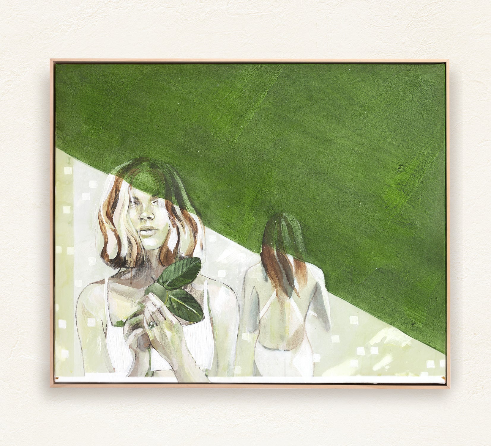 A contemporary abstract painting featuring two women intertwined with nature. One holds leaves close to her chest, gazing forward, while the other walks away, blending into lush green hues. The artwork evokes themes of self-discovery, balance, and harmony with the earth. Framed in a natural wood on a plaster wall.