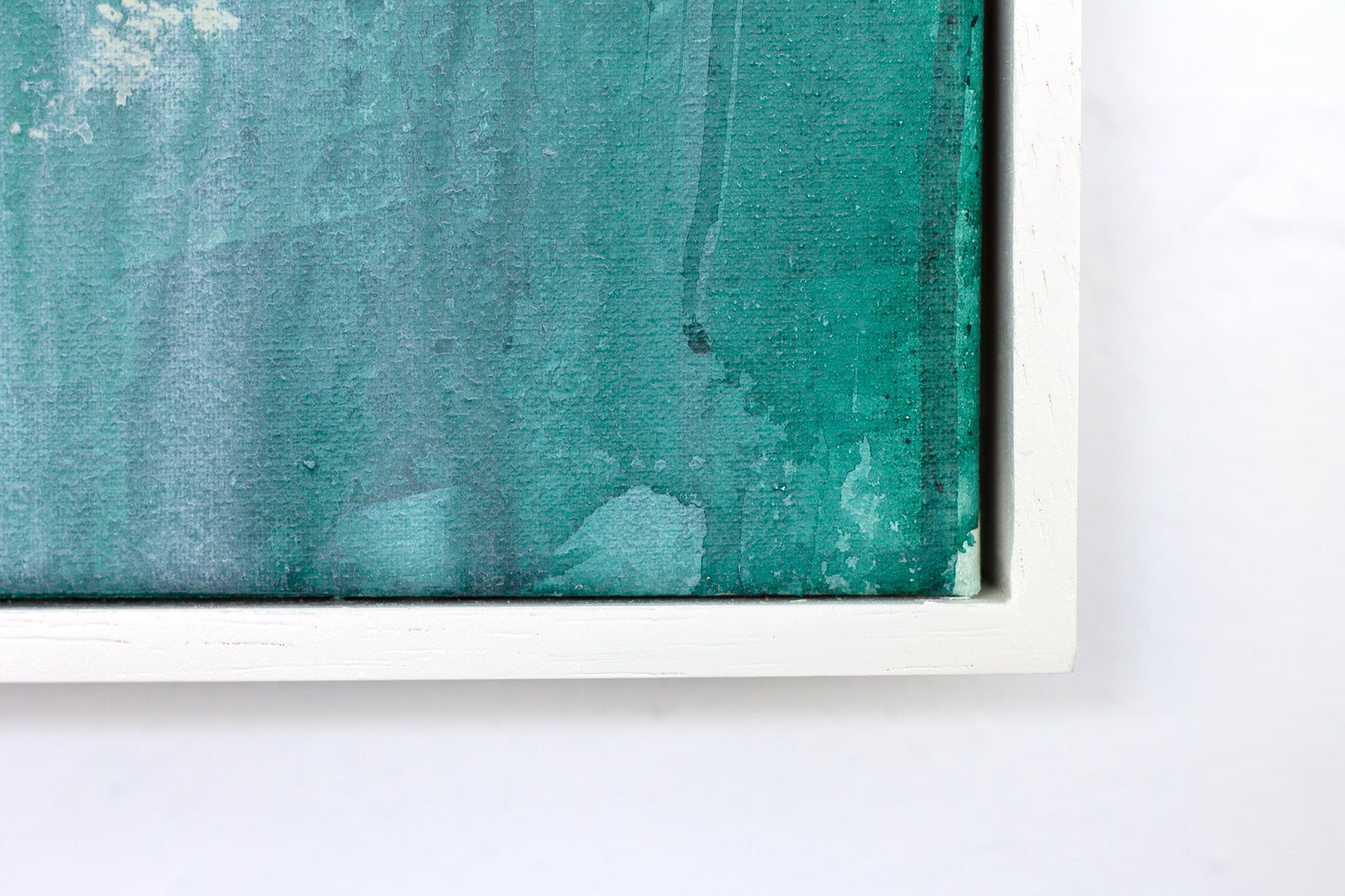 Close up detail of the white tray frame for painting Reflect by Hannah Adamaszek.