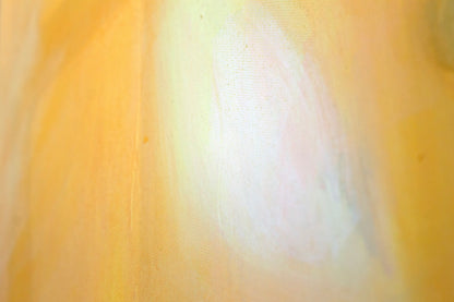 Close up art detail with the texture of the canvas and paint. Orange leading to a white glow.