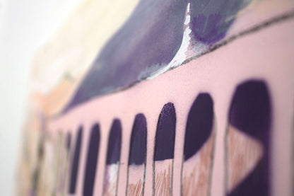 Close up detail of mediterranean arches in Nerja in a soft pastel pink.