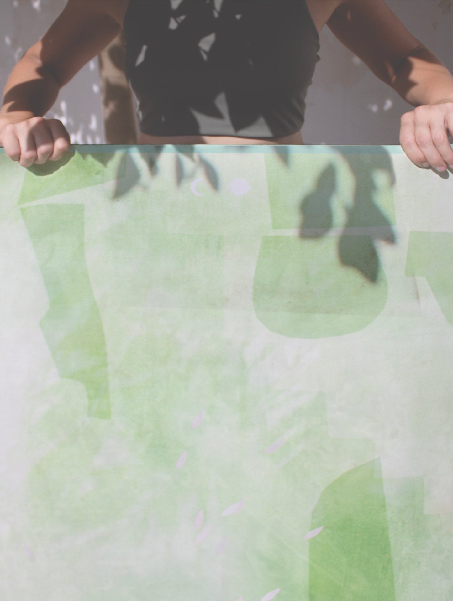 Algae Forest eco yoga mat cast in shadow on studio floor — natural rubber base and vegan suede surface by Hannah Chloe.