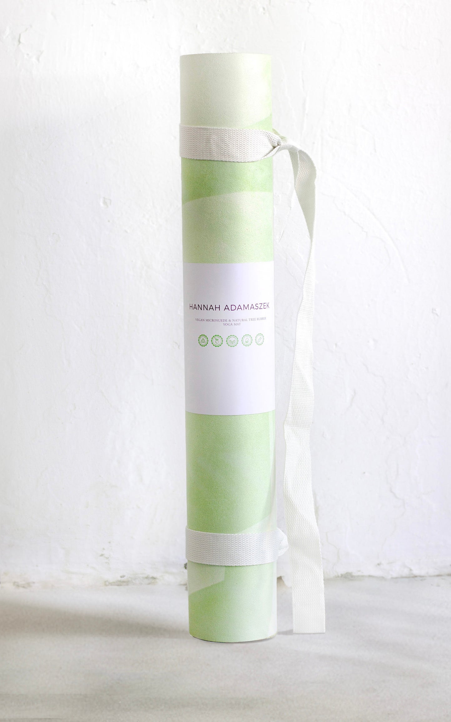 Algae Forest eco yoga mat with cotton carry strap — natural rubber base and non-slip vegan suede surface, design by Hannah Chloe.