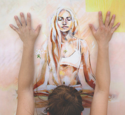 Hands pressing on the Apricot Glow eco yoga mat by Hannah Chloe — natural rubber base and non-slip vegan suede surface in soft apricot tone.