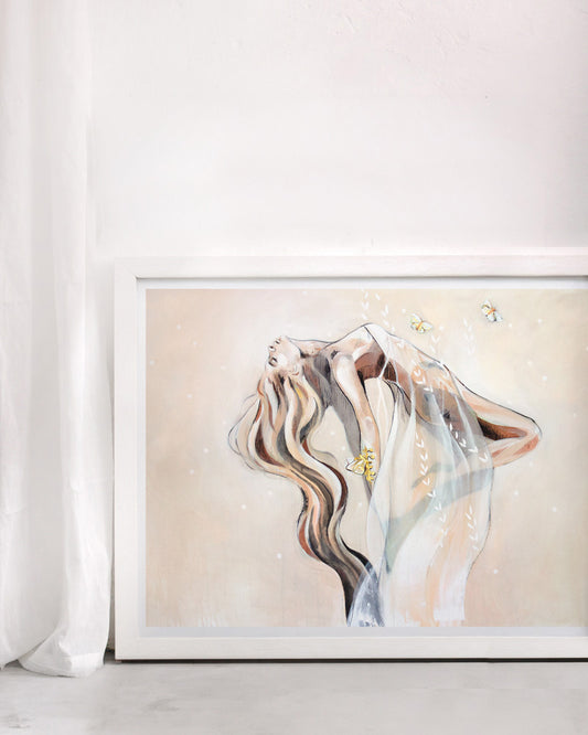 Framed fine art print featuring an ethereal floating female figure with flowing hair and butterflies, soft neutral tones, artwork by Hannah Adamaszek.