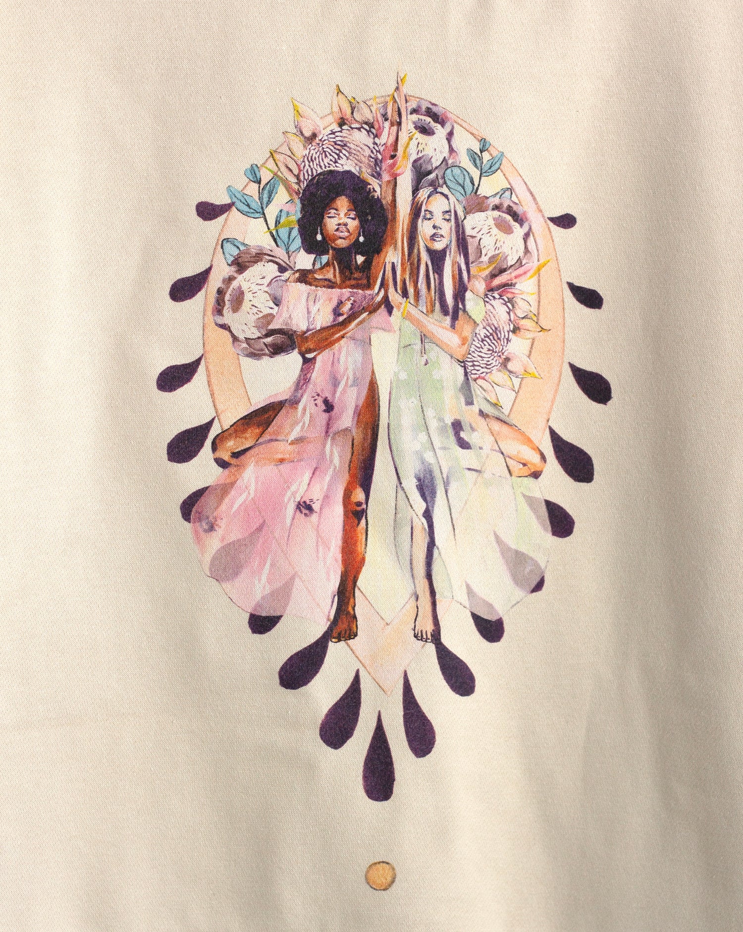 Close-up of the Grounded sweatshirt artwork by Studio Hannah Chloe, featuring two women in yoga tree pose surrounded by floral and earthy details.