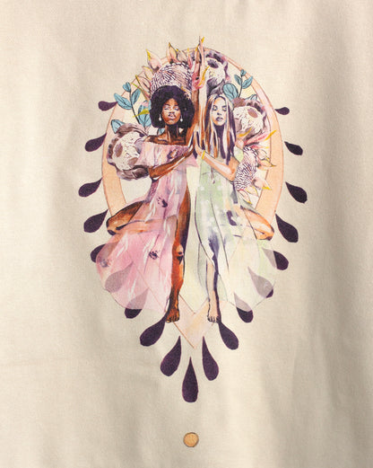 Close-up of the Grounded sweatshirt artwork by Studio Hannah Chloe, featuring two women in yoga tree pose surrounded by floral and earthy details.