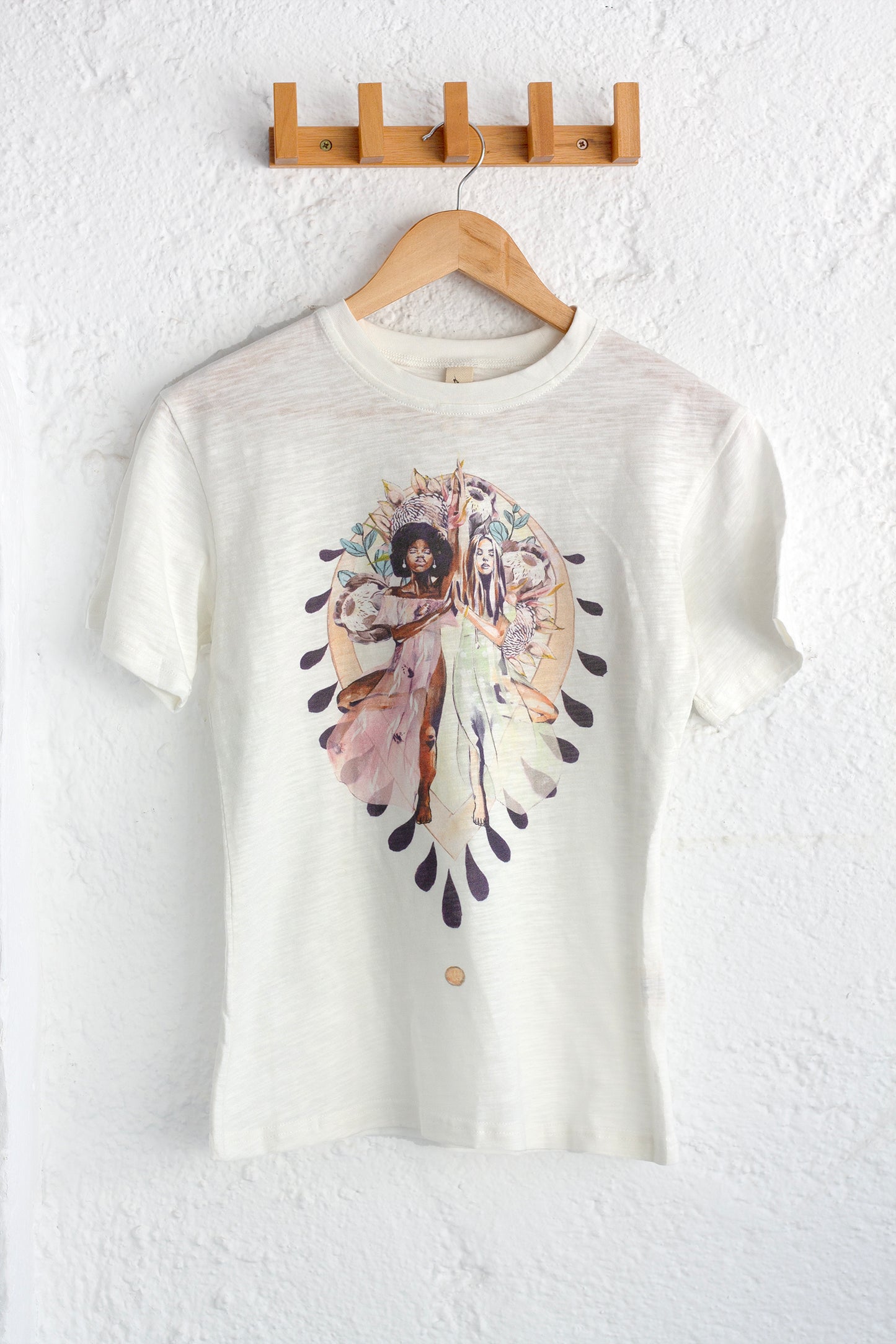 Organic cotton t-shirt featuring the Grounded print by artist Hannah Chloe, created in collaboration with Chasing Rivers.