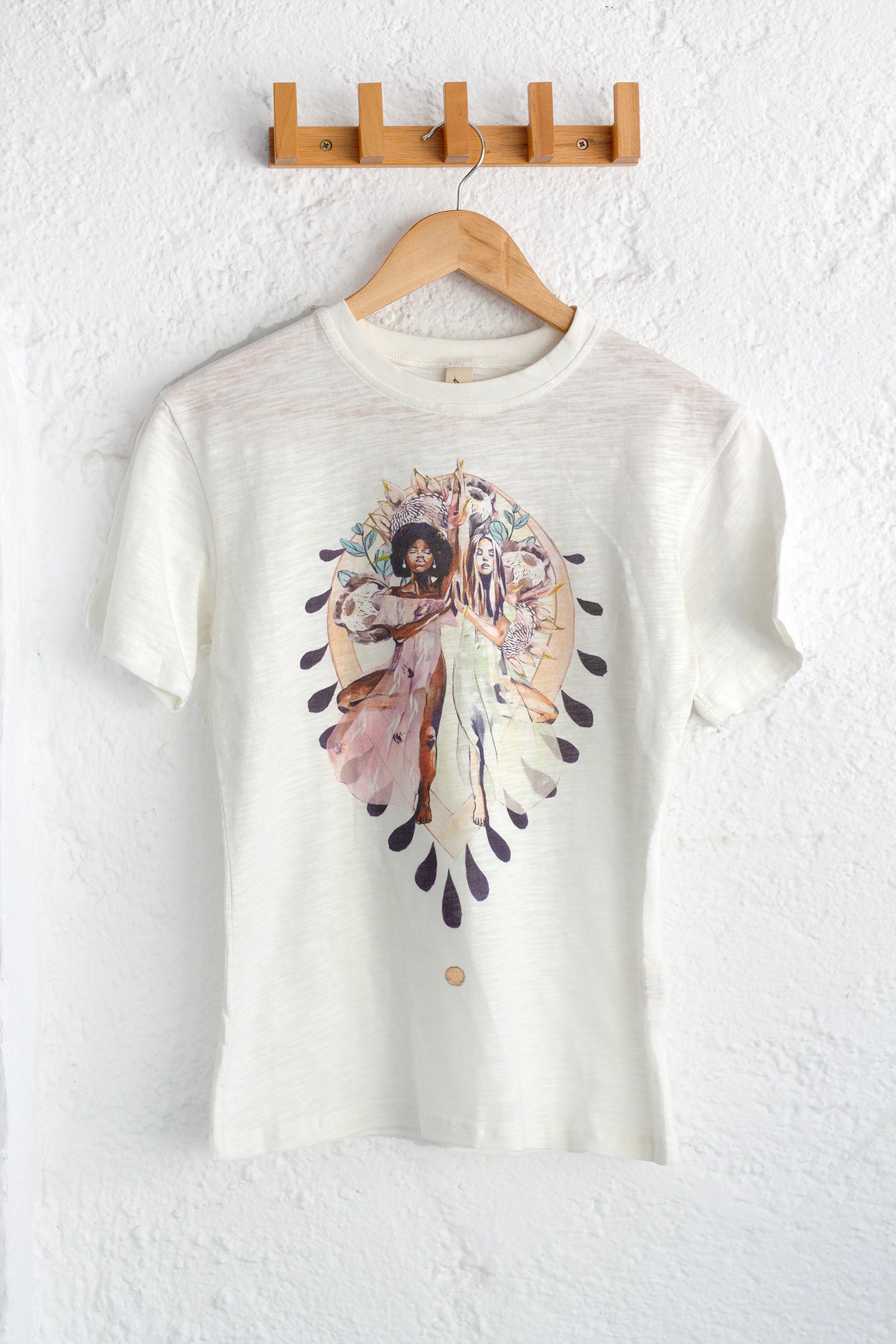 Organic cotton t-shirt featuring the Grounded print by artist Hannah Chloe, created in collaboration with Chasing Rivers.