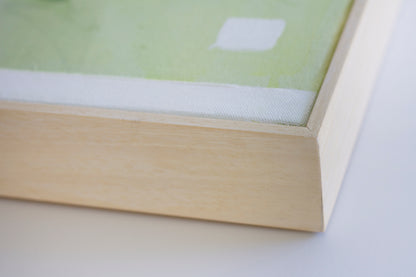 Close up detail of the natural wooden tray frame of painting Soothe by Hannah Adamaszek.